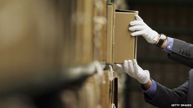 Man removing files from the National Archives