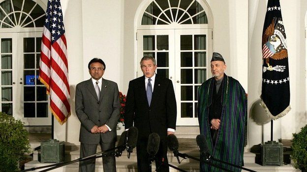President George W Bush makes a statement with then Pakistani President Gen Pervez Musharraf and Afghan President Hamid Karzai 27 Sept 2006, in the Rose Garden at the White House.