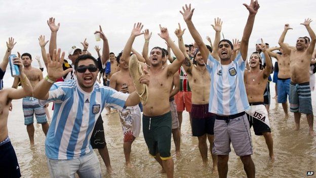 Argentina soccer fans on Copacabana beach in Rio de Janeiro, Brazil, 11 July 2014