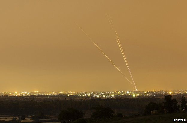 Rockets are fired from the north of the Gaza Strip towards Israel, 12 July