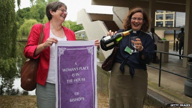 Women celebrating outside the General Synod after the vote