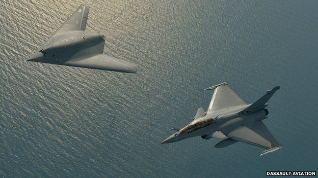 A Neuron UCAV and Rafale fighter jet flying in formation