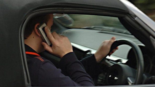 Driver on mobile phone