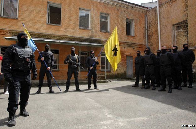 Azov Battalion fighters parading with flags in Kiev, 3 June