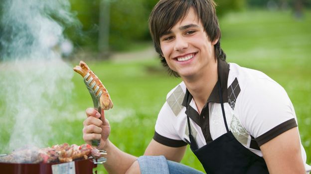 young man at barbecue
