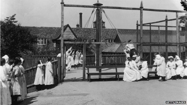 Girls playing at one of the schools in Bournville Village near Birmingham, a new town founded by Chocolate manufacturer and social reformer George Cadbury, July 1909