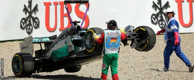 Lewis Hamilton's car being towed away