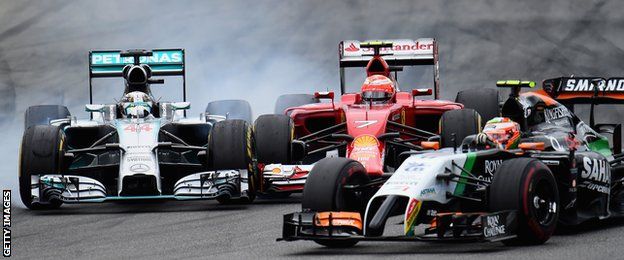 Lewis Hamilton collides with Kimi Raikkonen at the German Grand Prix.