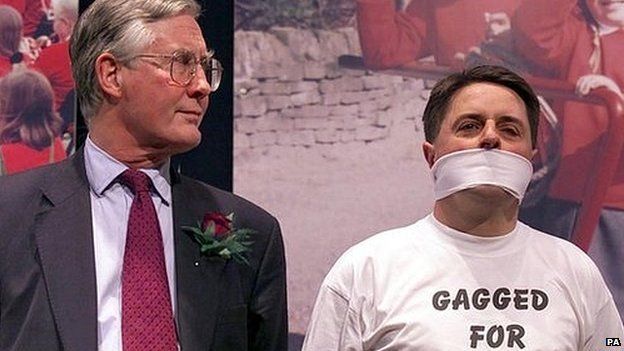 Nick Griffin makes a protest at the 2001 general election count in Oldham West, where Labour MP Michael Meecher (left) was elected