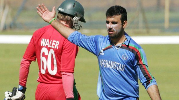 Afghanistan's Dawlat Zadran celebrates a Zimbabwe wicket