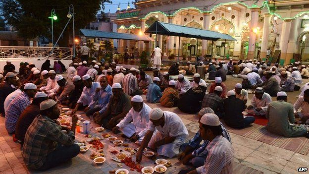 Indian Muslims break their fast during the holy month of Ramadan in Hyderabad on July 18, 2014.