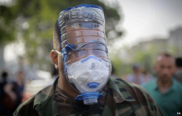 A protester in Turkey wearing an improvised gas mask