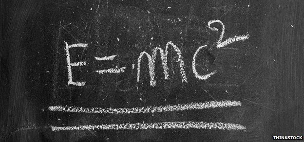 blackboard reads "E=MC2"