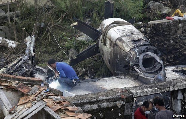 Wreckage of a TransAsia Airways plane that crashed in Taiwan