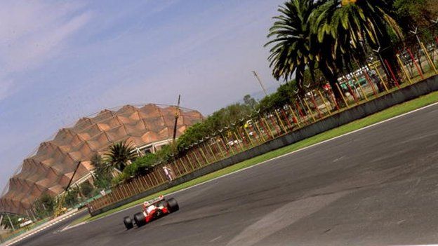 Rear view of a McLaren driver in action during the Mexican Grand Prix at the Mexico City circuit in 1989