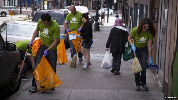 Zendesk employees picking up litter in Tenderloin