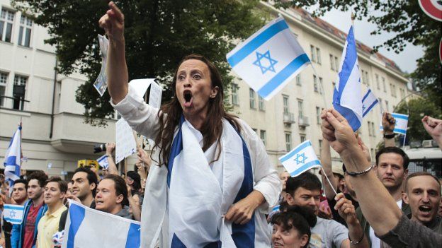 Pro-Israel demonstrators shout slogans while protesting in Berlin - 25 July 2014