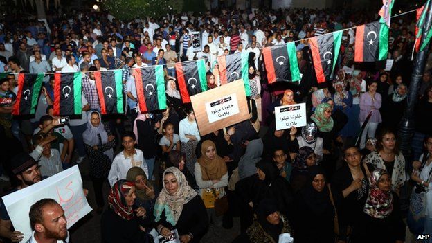 Libyans condemn and urge for an end of war during a protest at the Algeria Square on 26 July 2014 in Tripoli, Libya.