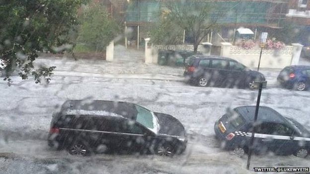 Torrential rain and flash flooding cause travel chaos - BBC News