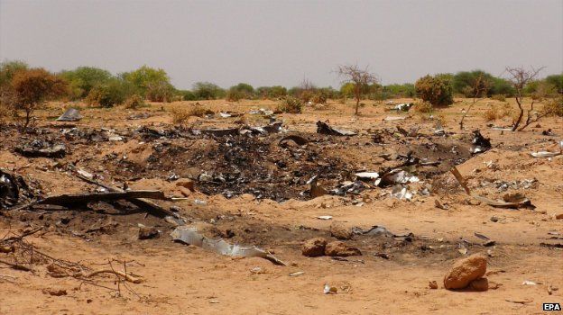 Debris is seen at the crash site of Air Algerie flight AH5017 near the northern Mali town of Gossi - 27 July 2014
