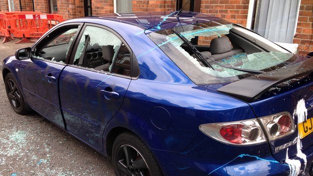 The windows of this car in Rosebery Street were smashed in