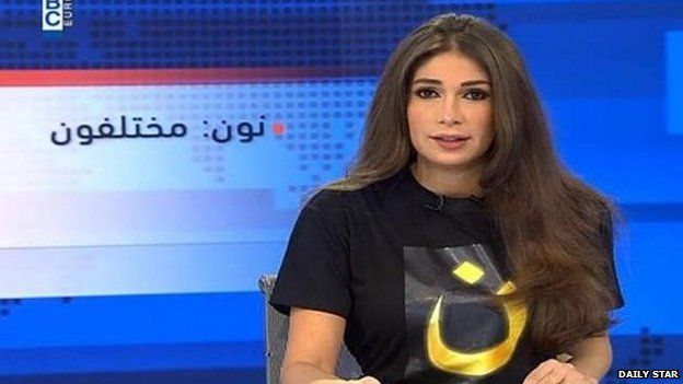 Screenshot of Dima Sadeq wearing a T-shirt in solidarity with Christians