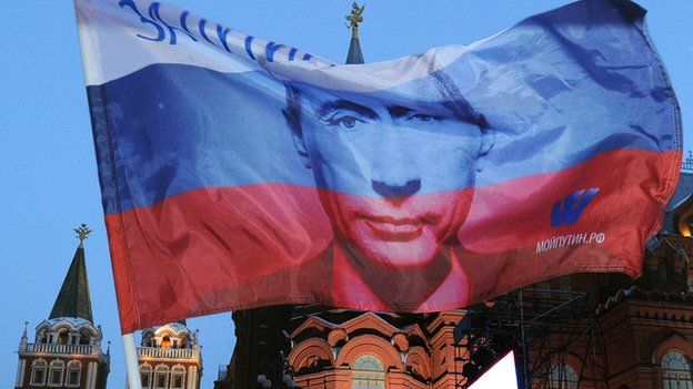 Russian flag with President Putin's face