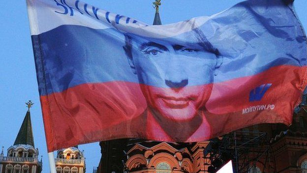 Russian flag with President Putin face