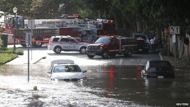 Cars on flooded street near UCLA, Westwood