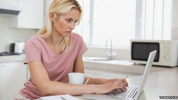 woman at home on laptop computer