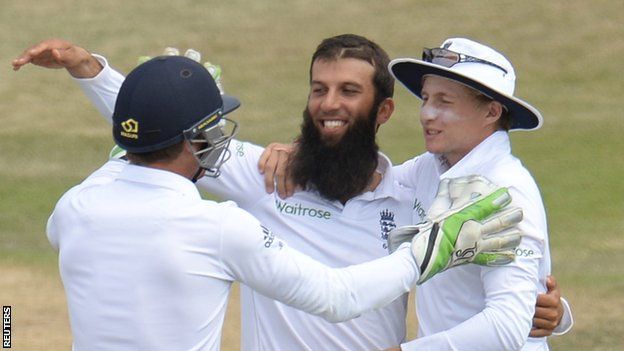 England's Moeen Ali is congratulated