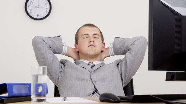 Man sleeping at desk