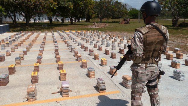 A drugs haul guarded by a Panamanian soldier
