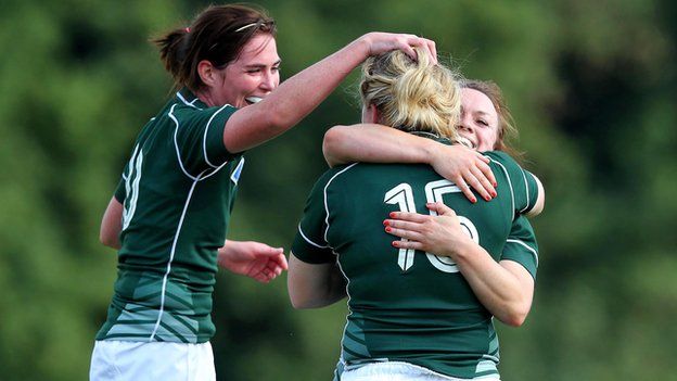 Niamh Briggs is congratulated by team-mates Nora Stapleton and Lynne Cantwell after scoring Ireland's first-half try in Paris