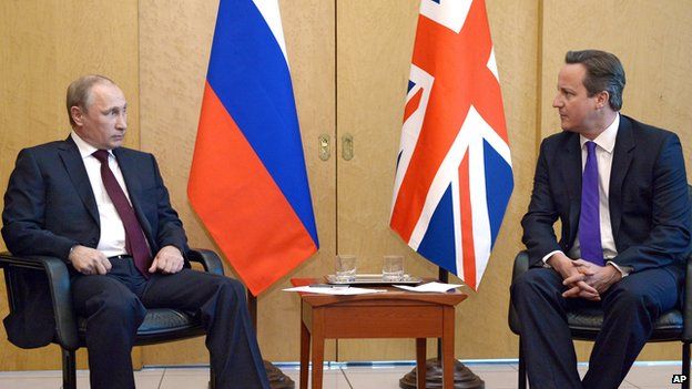 Vladimir Putin and David Cameron in June 2014
