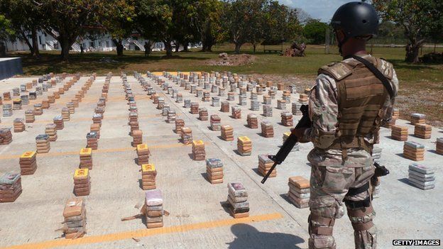 A drugs haul guarded by a Panamanian soldier