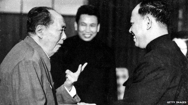 A photo taken in the 1970's outside of Cambodia, shows China's chairman Mao Zedong greeting top Khmer Rouge official Ieng Sary while Khmer Rouge leader Pol Pot looks on