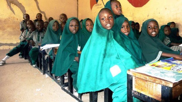 Children read from the Koran on 23 May 2014 in a classroom of the Future Prowess Islamic Foundation School in the north-eastern Nigerian city of Maiduguri