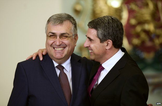 Bulgarian President Rosen Plevneliev (right) hugs new caretaker Prime Minister Georgi Bliznashki in Sofia, 5 August