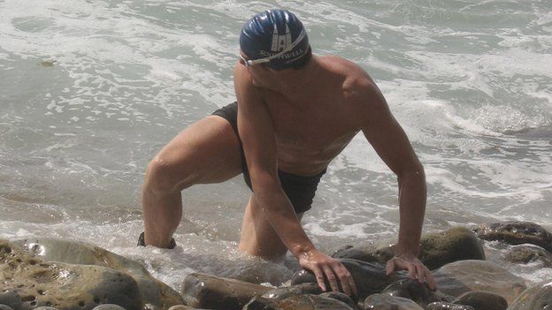 Adam Walker completes his swim across the Catalina Channel