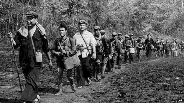Khmer Rouge leader Pol leads a column of his men, in this photo obtained in 1979 by Japans Kyodo News service