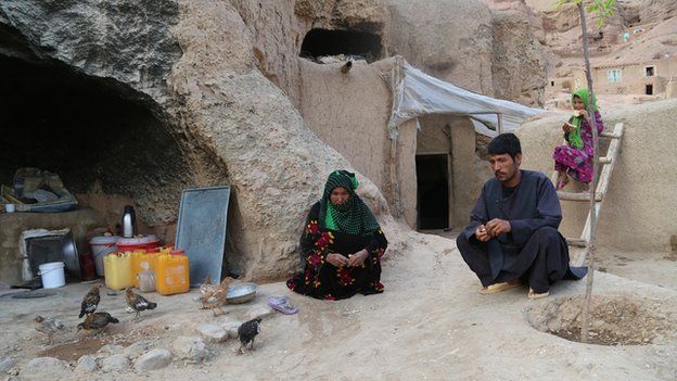 Halima and her family keep live stock at their cave dwelling to help them survive