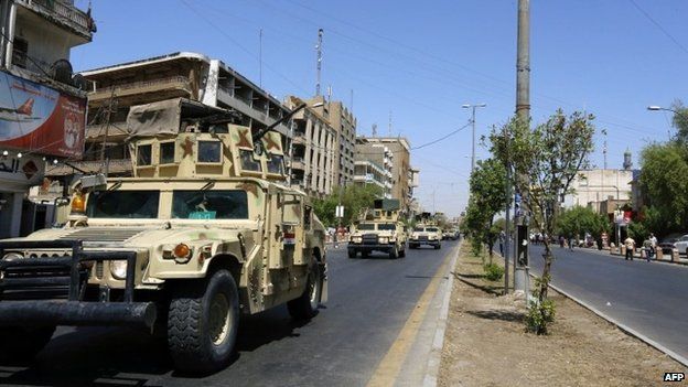 Armoured vehicles on Baghdad street - 11 August
