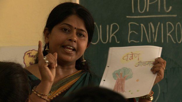 Teacher gives a Sanskrit lesson