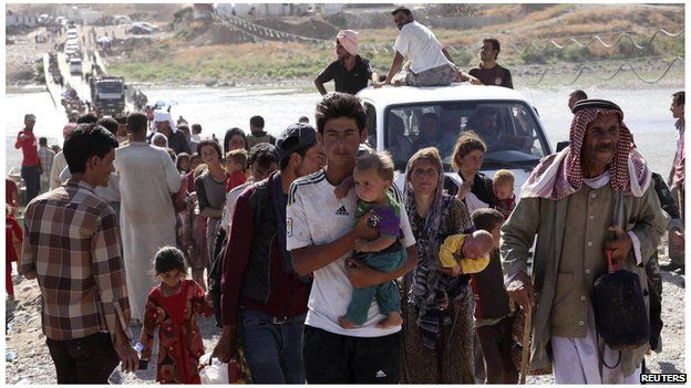Displaced people from the Yazidi sect, fleeing the violence in Sinjar