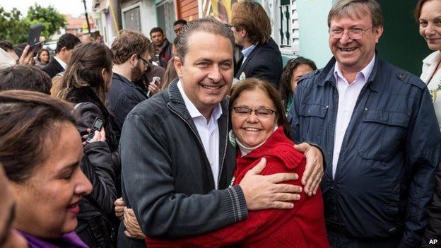 In this July 29, 2014, Eduardo Campos poses for a photo with a supporter during a campaign rally, in Osasco, Brazil.
