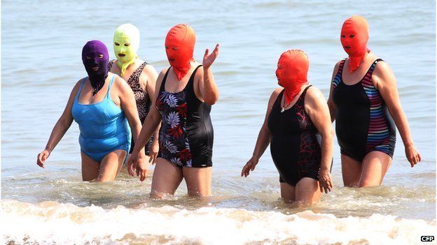 Picture of women at Qingdao wearing Face-kinis.