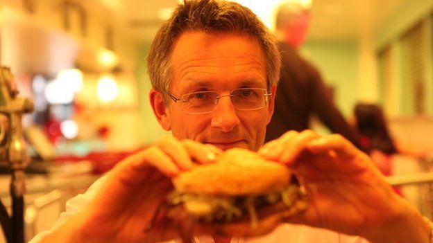 Michael Mosley tucking into a burger
