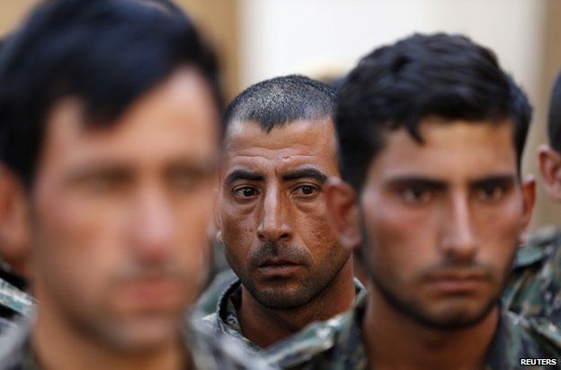 Iraqi Yazidi recruits under training with Kurdish forces in Qamishli, north-eastern Syria, 16 August