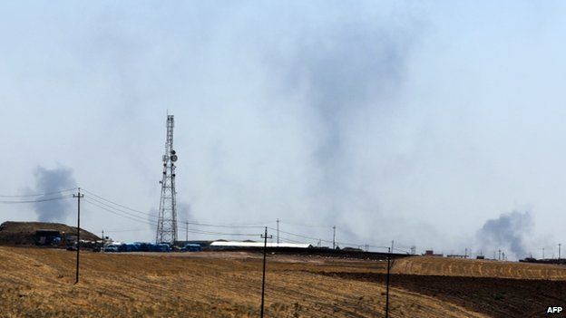 Smoke rises from the direction of Mosul dam, Iraq, 17 August